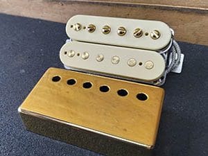 gold humbucker cover and poles cream bobbins